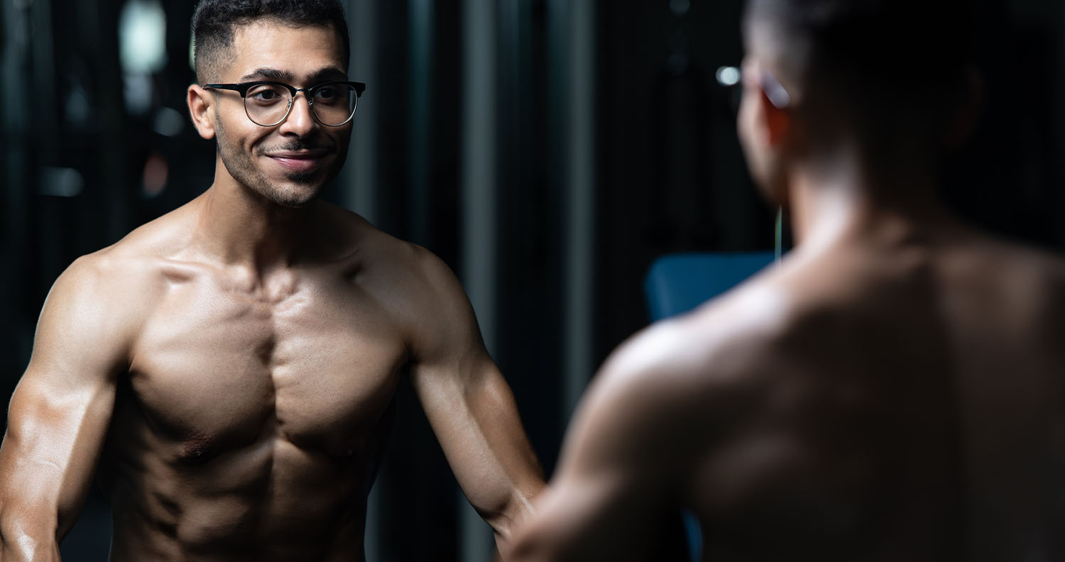 Bodybuilder With Gynecomastia Problem Flexing Muscles Bodybuilder With Gynecomastia Problem Flexing Muscles